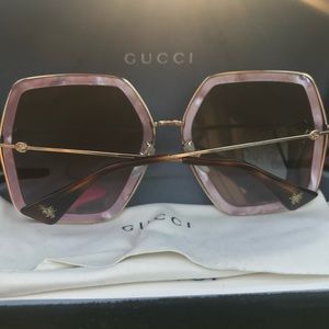 Too many GUCCI sunglasses.